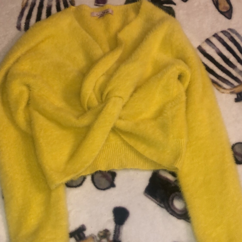 yellow sweater.